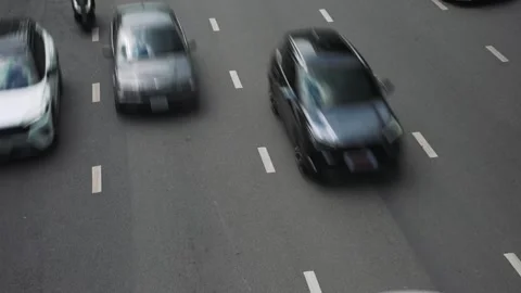 Top view time lapse of busy asphalt road with heavy traffic during rush hour in Stock Footage 295836255