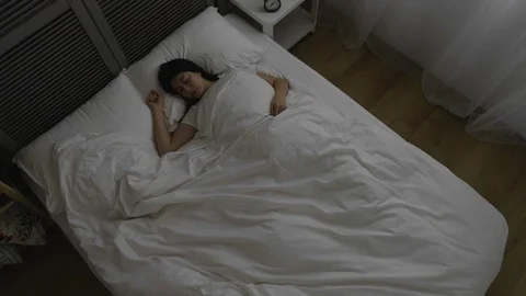 Top view time lapse of young well sleeping woman Stock Footage 104232475