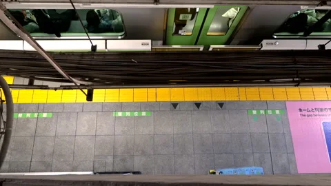 Top view Timelapse of Metro Train on JR Yamanote Line close the door Stock Footage 189388051