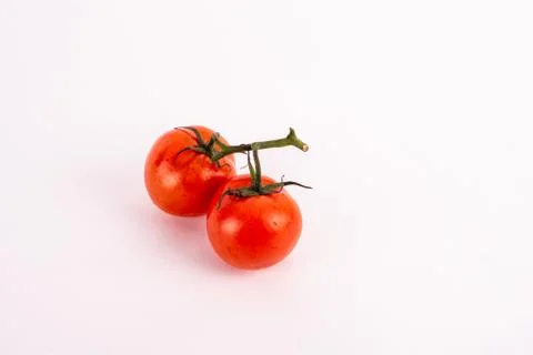 Top view. Tomatoes on the white background. Stock Photos