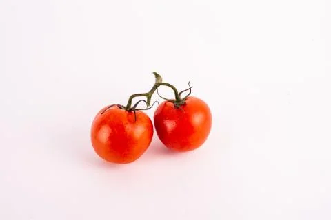 Top view. Tomatoes on the white background. Stock Photos
