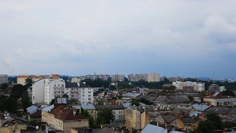 Top view of town full of building. Shot from roof. Good weather, morning Stock-Footage 98561607