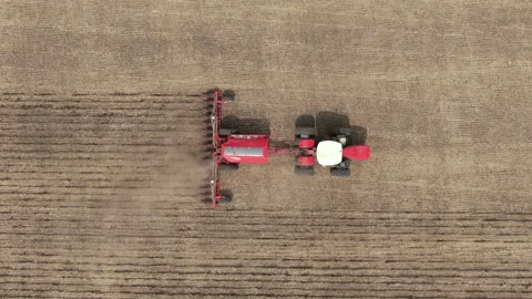 Top view of a tractor in a field Видео 233906750