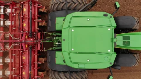 Top view of tractor planting seed in field Video stock 243735779