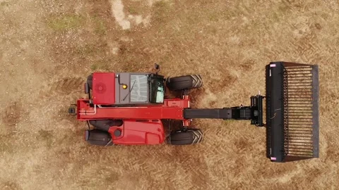 Top view of tractor pulling mechanical seeder, combine harvester Video stock 243735751