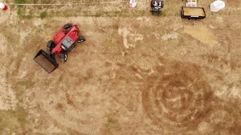Top view of tractor pulling mechanical seeder, combine harvester Stock-Footage 246972841
