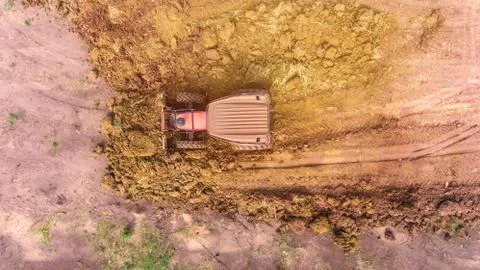 The top view of a tractor is working. Stock Photos