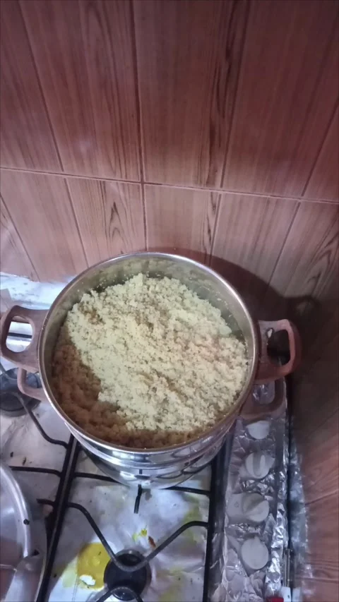 Top View of Traditional Couscous Steaming in a Stainless Steel Steamer Stock Footage 333865667