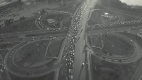 Top view of a traffic intersection, at rush hour, black and white video with Stock Footage 139858667