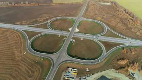 Top view of traffic intersection. Trucks and cars drive along the highway. Top Stock-Footage 133644627