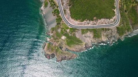 Top view traffic road around the beach. Aerial drone top down view curves of Stock Footage 237838024