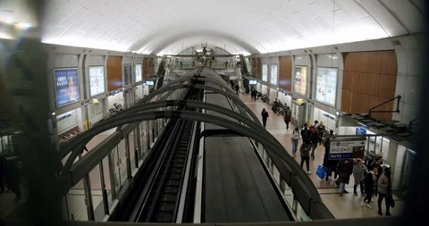 Top view on the train in metro station in Paris. walking people. Paris, France - 動画素材 126837134