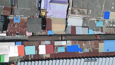 Top view - train rides among the roofs of a street market, Patterns And Stock-Footage 338360325