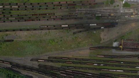 Top view of the train trailers parked at the railroad station, drone view, 4k Stock Footage 163895086