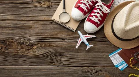 Top view travel kit elements table. High quality and resolution beautiful ... Stock Photos
