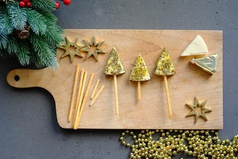 Top view of tree-shaped cheese snack on a cutting board Stock Photos