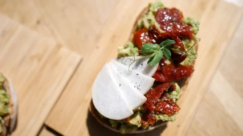 Top View Of Trendy Breakfast With Avocado Toast. Stockbeeldmateriaal 111429459