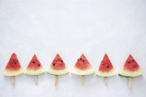 Top view of triangular cut popsicle watermelons on a white background 写真素材