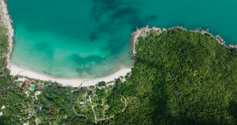 Top view of tropical beach and green coastline. Ko Pha Ngan, Thailand. Video stock 311619199
