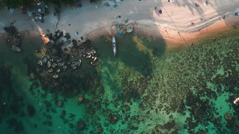 Top view tropical beach with clear turquoise sea water and reefs suitable for Stock Footage 250172893