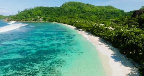 Top view of tropical beach with clear water. Seychelles, Mahe. Stock Footage 311492252