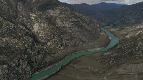Top view of turquoise river in canyon among mountains. Drone shooting. 4K Stock Footage 123217459
