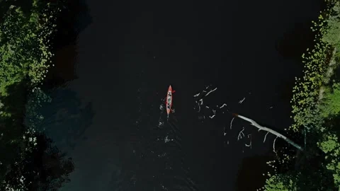 Top view of two active guys enjoing kayaking on the river Stock Footage 152904715