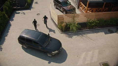 Top View Two Burglars Attempt to Break Into Car but Fail Car Theft Prevention Stock Footage 291944404