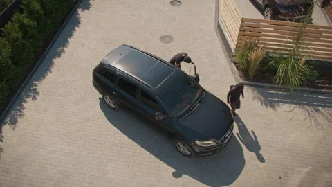 Top View Two Burglars Fail to Break Into Car AI-Powered Vehicle Theft Prevention Stock Footage 291939176