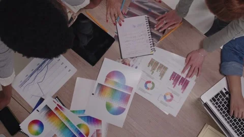 Top view Two businesspeople using digital tablet to analyzing data in an of.. Stock Footage 256740872