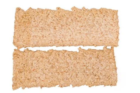 Top view of two flat rye-wheat crispbreads, close-up Stock Photos