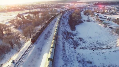 Top view of two freight trains with carriages on railways at winter Stock Footage 70716268