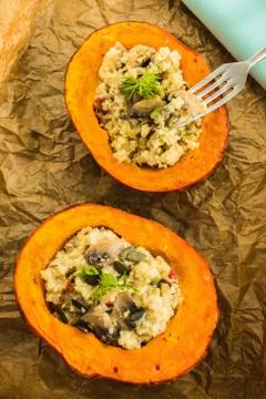 Top view of two halves of a baked orange pumpkin Stock Photos