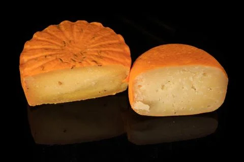 Top view of two halves of different hard yellow cheese heads Stock Photos