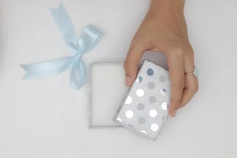 Top view two hands holding and open the empty gift box isolated white backgro Stock Photos