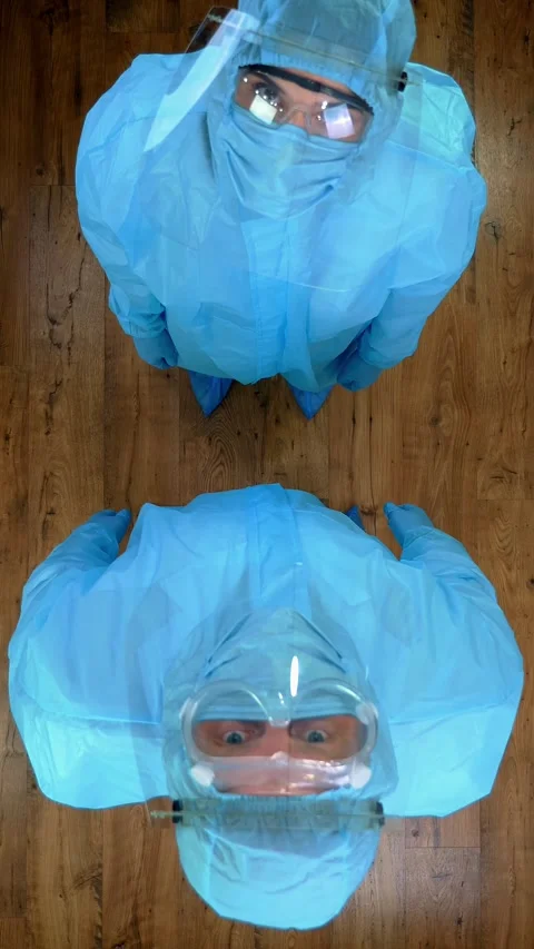 Top view. two medical workers in special protective suits, uniforms, masks, Stock Footage 317538078