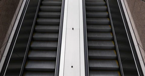 Top view of two moving up and down  escalator. Stock Footage 114835600