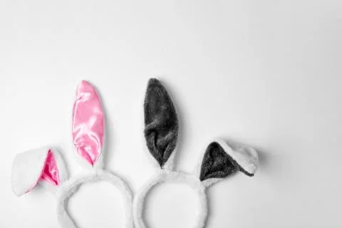 Top view of two rabbit ears on white background pink and couple love holiday  Stock Photos