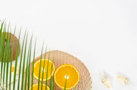 Top view under palm tree summer beach vacation, coconut, starfish and oranges Stock Photos