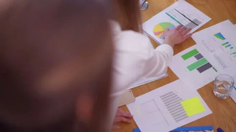 Top view unrecognizable creative team having a progress meeting. Video stock 61137490