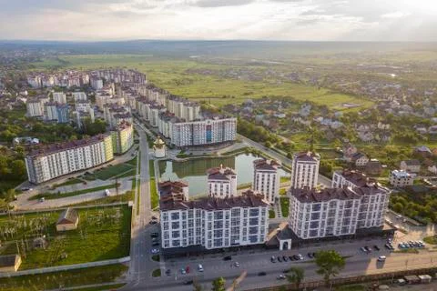 Top view of urban developing city landscape with tall apartment buildings and Stock Photos