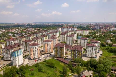 Top view of urban developing city landscape with tall apartment buildings and Stock Photos