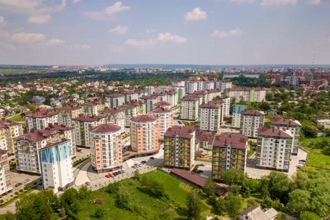 Top view of urban developing city landscape with tall apartment buildings and Stock Photos