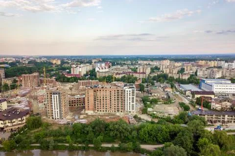 Top view of urban developing city landscape with tall apartment buildings and Stock Photos