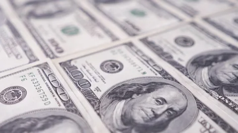 Top view of US one hundred dollar bills pattern. Financial background. Stock-Footage 335874984