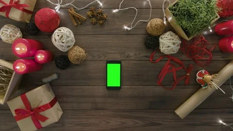 Top View Using Smartphone Christmas Gifts Stock Footage 81451907