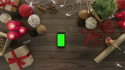 Top View Using Smartphone Christmas Gifts Stock Footage 81452338