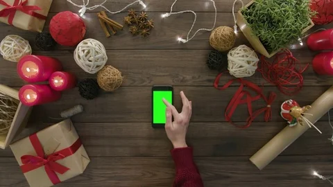 Top View Using Smartphone Christmas Gifts Stock Footage 81452810