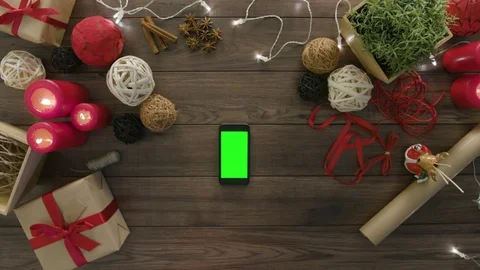 Top View Using Smartphone Christmas Gifts Stock Footage 81453035