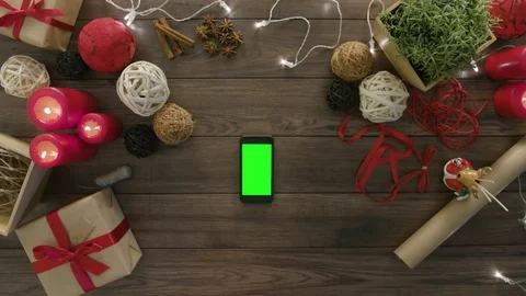 Top View Using Smartphone Christmas Gifts Stock Footage 81453732